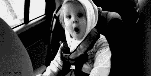 excited_child_in_back_of_car-ab1b02.gif