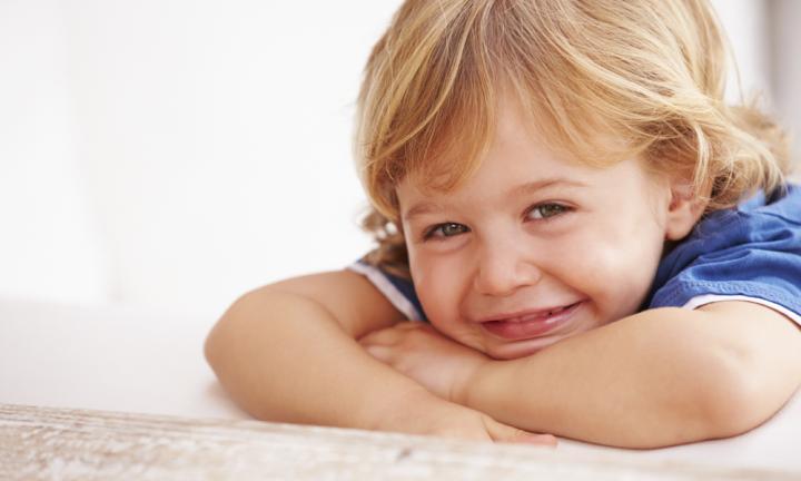 portrait-of-smiling-young-boy-playing-outside-20160303160301.jpg-q75-dx720y432u1r1gg-c-506f54.jpg